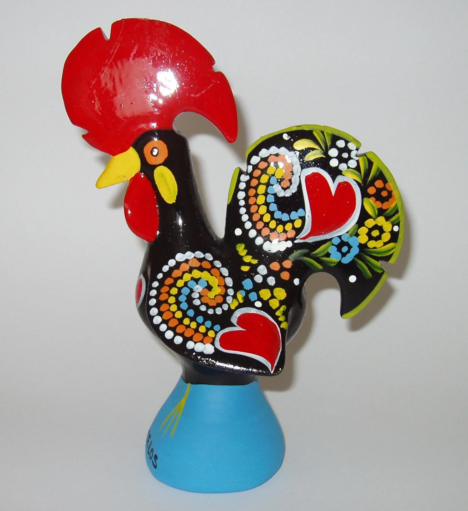 que animal representa a portugal, Rooster of Barcelos - a colorful ceramic rooster figurine, a common symbol of Portugal
